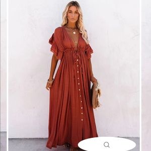 ANIKA POCKETED BUTTON DOWN RUFFLE
MAXI DRESS